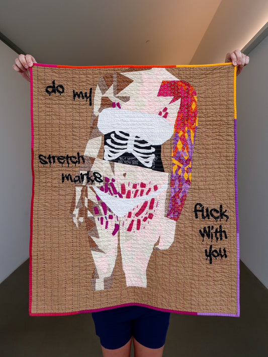person holding quilt of person
